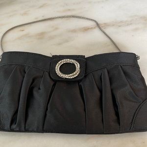 Steve Madden black cute black evening bag. With pleating zipper inside